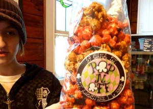 Bella and a bag of flavored popcorn