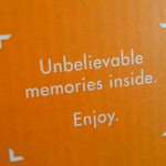 The bright orange packaging of a Shutterfly delivery